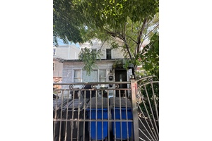 2 family residence with a separate entrance, finished basement in the prime location of Morris Park.
