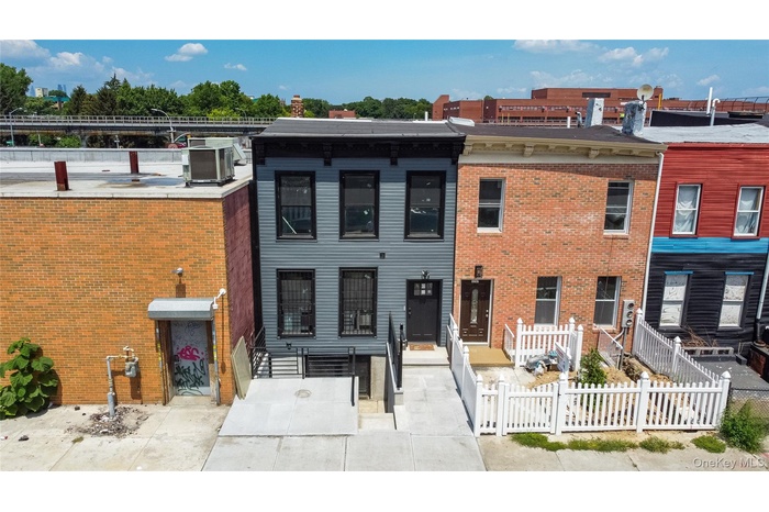 View of front of house with brick siding