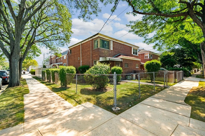Traditional home with brick siding