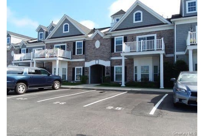 View of front of house featuring uncovered parking