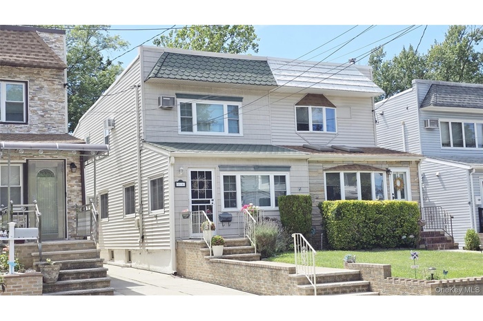 View of front of home with a front yard