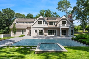 Stunning new construction situated on a 1.