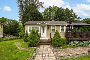 Well maintained and recently updated home set on lovely usable property affording privacy in the rear.