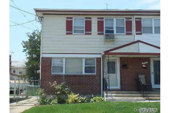 Multi unit property with brick siding