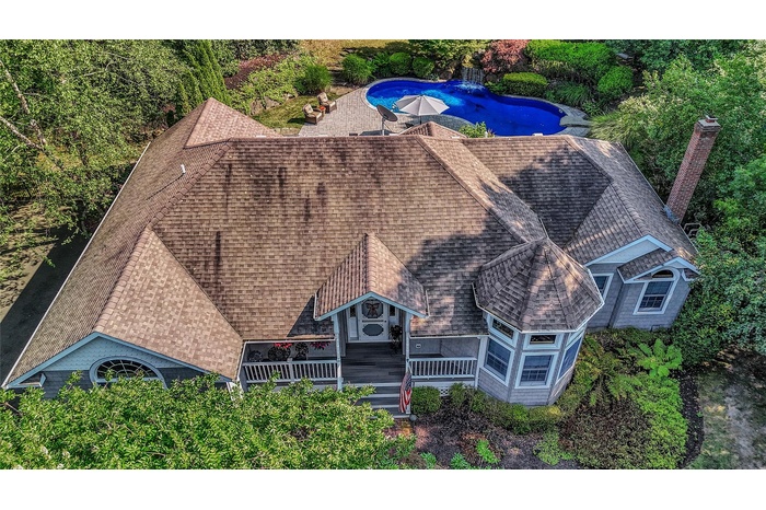 View from above of property featuring a pool