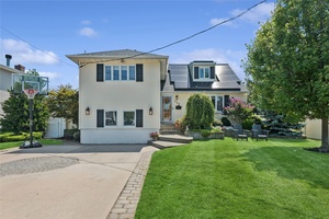 Welcome Home to this Stunning split quietly nestled in the highly sought after village enclave of Massapequa !