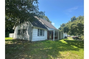 Welcome to this classic Cape style home situated on a spacious 0.