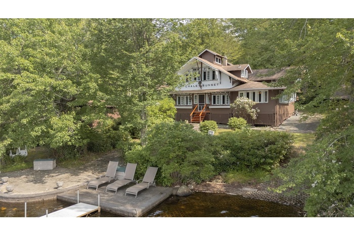 Welcome to Chalet Sunset, an iconic lakefront seasonal home in beautiful Wanaksink Lake