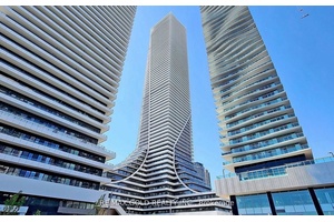 Experience luxury living in this breathtaking suite on the 52nd floor, offering spectacular north, east, and south views of the city, downtown CN Tower, and the lake.