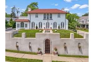 Rare find ! Mediterranean gem overlooking the Sound with piazza, fountains and a storied past.