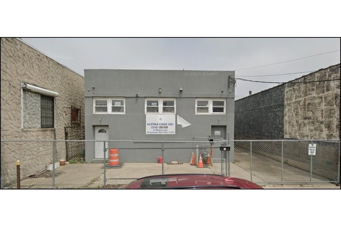 View of front facade with stucco siding