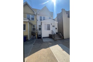 Fully Renovated 2 Family with 2 Car Garage in Prime Ridgewood !