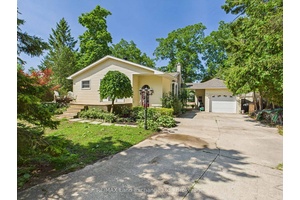 Perfect retirement home that features partial lake view with close proximity to the shores of Lake Huron.