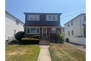 New to the Market ! This charming legal 2 family home is perfectly situated in the highly sought after Lynbrook School District 20, offering the ideal combination of convenience and ...