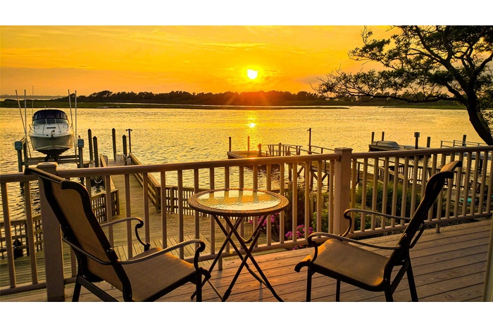 Dock with a water view and boat lift
