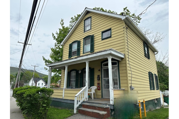 View of front of home with covered porch