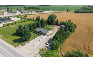 Here is the best of BOTH worlds a private and secluded backyard country oasis WITH highway frontage exposure for advertising, business or simply people watching.