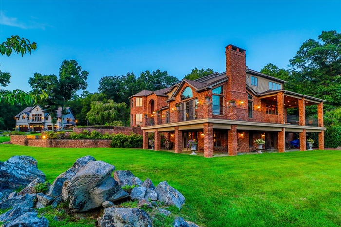 Gorgeous 3 story home, 4000 sqft garage with full loft on 15+ acres