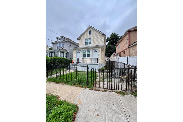 View of front of house with a fenced front yard
