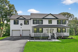 Welcome to this stunning 4 bedroom, 3 bathroom colonial home nestled on a serene 1.