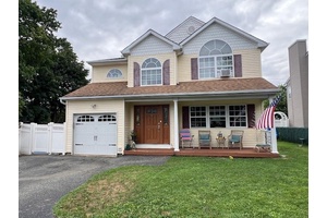 This Mint Colonial Offers Many Possibilities for Extended Families with having a Large Eat In Kitchen, Nice Size Formal Dining Room, Large Living Room, a Den, Plus 4 Full Bedrooms, ...