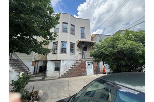 Come see this charming 2 family home in the desirable Van Nest Morris Park area of the Bronx !