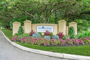 Welcome to 61 WindWatch Drive Hauppauge in the community Hamlet WindWatch on the Golf course.