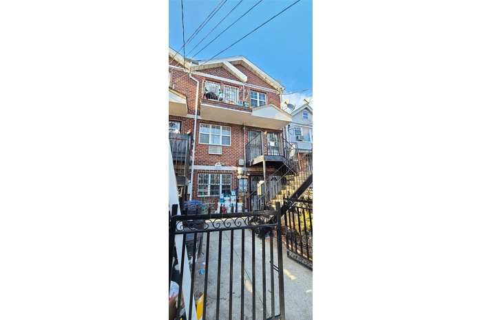 View of front of property with brick siding