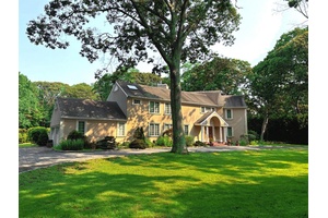 Nestled on 2. 15 acres in the exclusive Baywood community, this elegant 4 bedroom, 4 bath stucco home offers the perfect blend of privacy and resort style living.