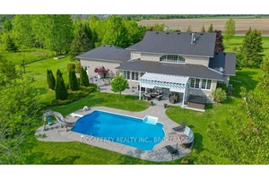 Discover an exquisite stone estate nestled on 18 picturesque acres located just minutes from downtown Napanee.