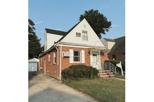 Just Listed this beautiful brick Cape style home in the heart of Fresh Meadows.