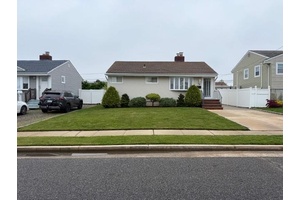 Well maintained three bedrooms one bathroom ranch style one family house on a large lot on a quiet residential block walking distance to the nautical mile.