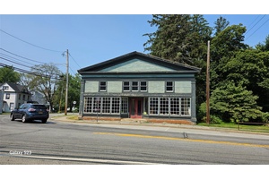 Discover a rare gem in the heart of Chester, NY, featuring a prime corner lot spanning approximately 1.