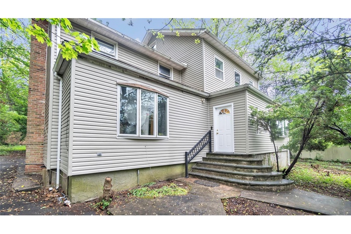 View of front of home featuring entry steps