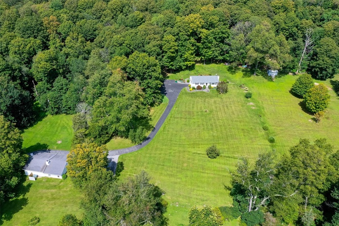 Two homes on 11.9 acres