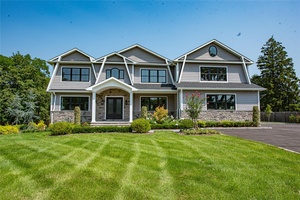 Enter This Majestic Home Through Oversized Double Doors Into A Bright Vaulted Foyer Welcomed By A Dramatic Bridal Staircase And 10 Foot First Floor Ceilings !