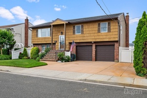 Welcome to this beautifully upgraded expanded waterfront Hi Ranch in Baldwin, offering 4 bedrooms and 3 full bathrooms on a 60x80 lot along a 50 ft wide canal.