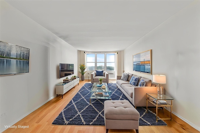 Living area with wood finished floors