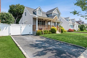 Welcome to this beautifully maintained 4 bedroom, 2 bath home located in the heart of Hicksville !