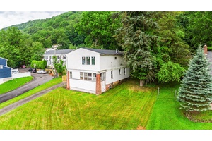 Investors step forward ! Amazing opportunity with this legal 2 family 3 Bedroom 1 Bath over a 2 Bedroom plus enclosed Porch 1 Bath.