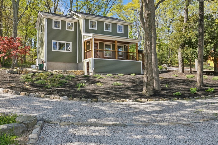 View of front of property with a porch