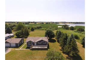 Pleasant Bay, a nature lover's paradise, provides the perfect backdrop for this quaint and updated bungalow, situated on 2.