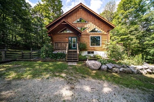 Discover this large 4 bedroom, 3 bathroom log home on a private 4.