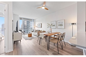 Bright amp ; Oversized 1 Den at Amber Tower Lower Penthouse Level !