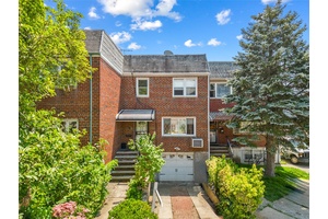 Charming All Brick Attached Townhouse in Prime North Flushing This well maintained tri level 1 family home features a spacious layout with a large living room, formal dining room, and ...