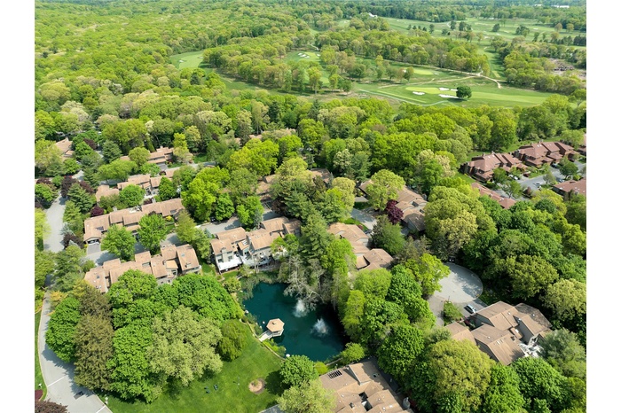 Aerial view of residential area with a large body of water