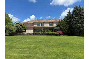 Beautiful Brick Contemporary Colonial in West Nyack on a level acre corner lot with views of Lake Deforest.