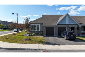 This Stittsville stunning Tamarack Kingbird model bungalow end unit townhouse, nestled on a large corner lot in the sought after Edenwylde adult lifestyle community, is a true dream home.