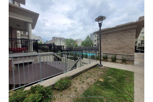Welcome to 17 Coneflower cres a beautiful 2 bedroom condo townhome nestled in a quiet, family friendly community in North York offers a modern layout filled with natural light and ...