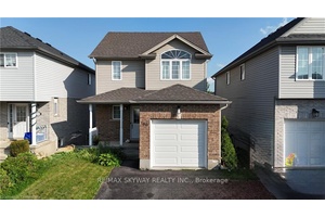 Welcome to this beautifully maintained single detached home, featuring a finished walk out basement.